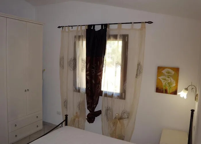 Casadelfaro Con Giardino A Pittulongu 600metri Dalla بيت للعطل أولبيا